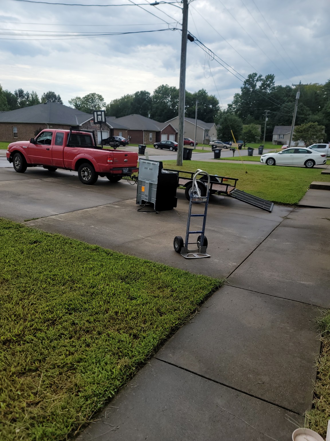 Appliances ready for removal by Lewis and Sons