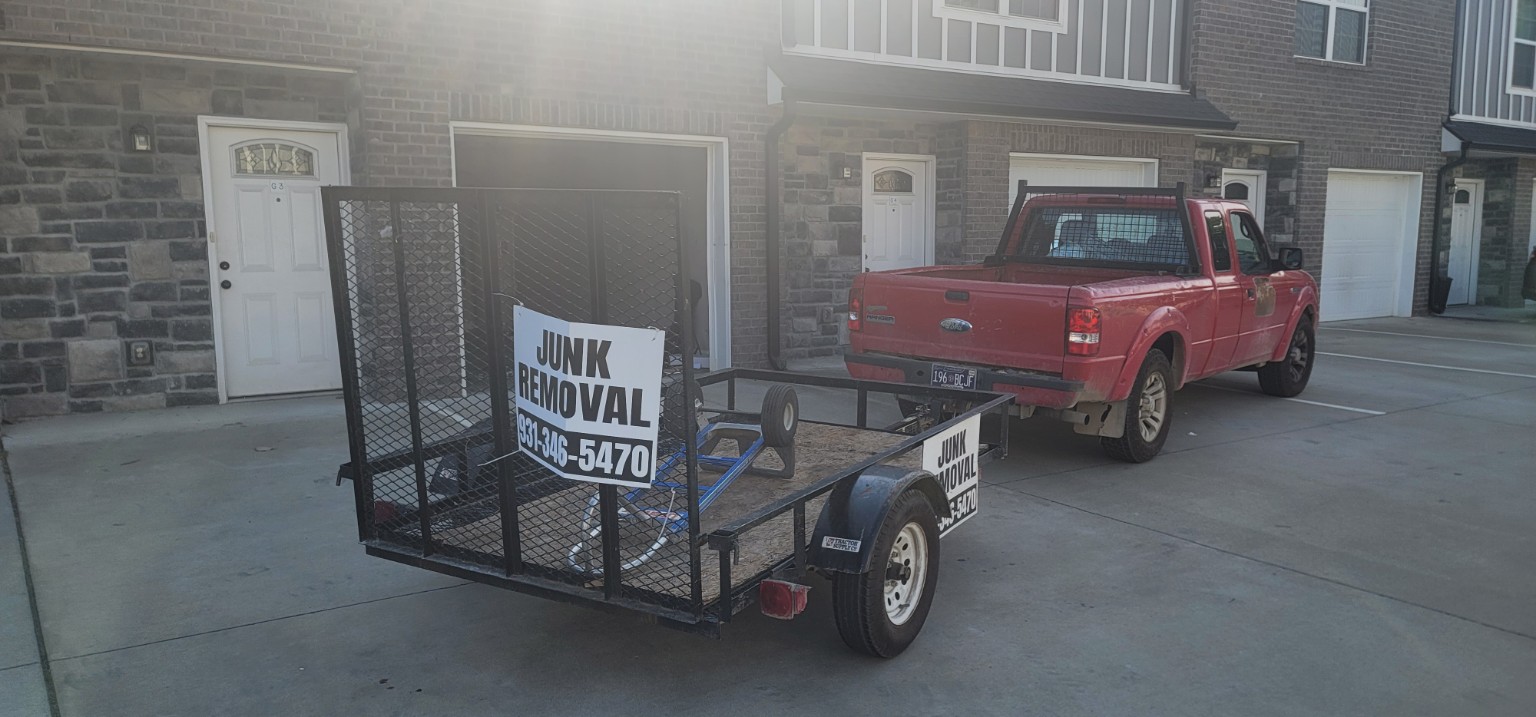Lewis and Sons truck and junk removal trailer